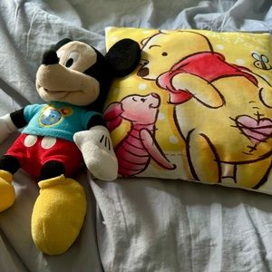 Stuffed toy mickey and pooh